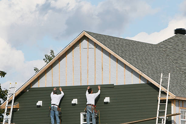 Professional Emergency Siding Repair technician working in Churchville, NY